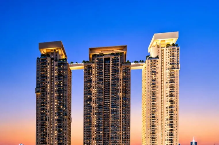 MSN Plot 6 towers in Neopolis, Kokapet, linked by a sky bridge at dusk (artist's impression)